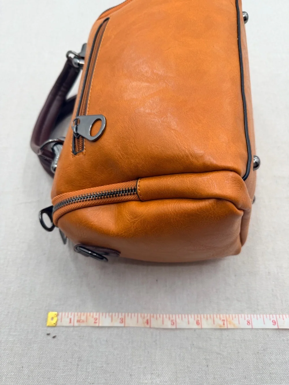 Structured Orange Satchel with Tassel Accent